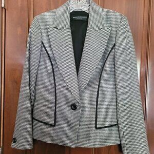 Dana Buchman wool jacket with black trim and two pocket flaps on the front.